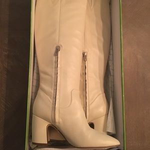 Tall, white leather boots